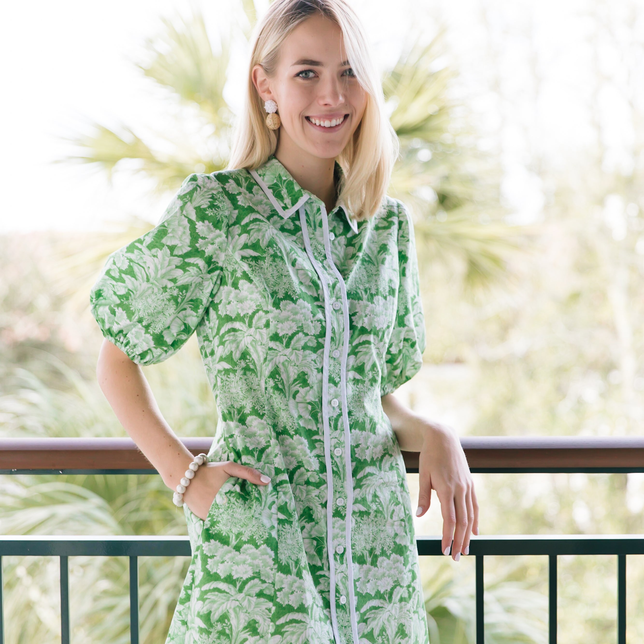 Model is wearing Liz White Rattan Ball Earrings_m donohue collection