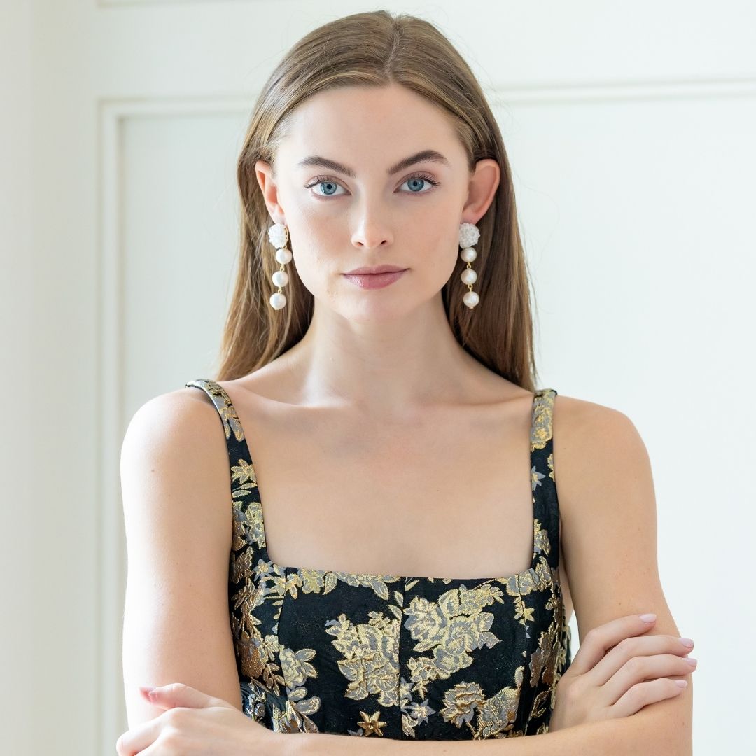 Model is wearing Liz Cotton Pearl Triple White Earrings_m donohue collection