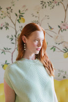 Model is wearing Triomphe Amethyst & Cotton Pearl Earrings_m donohue collection