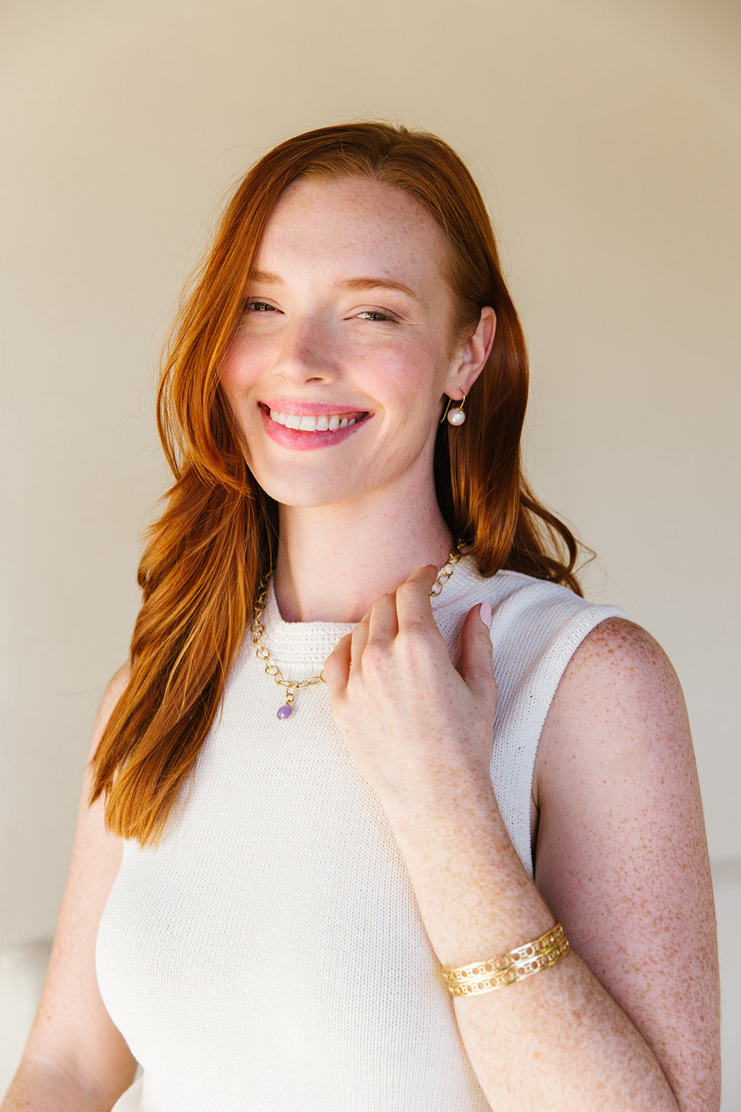 Model wears the Bloom Pearl Hook earring_m donohue collection